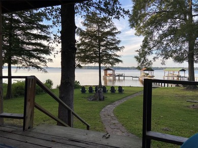Rustic Lakefront Log Home with Stunning Sunsets No HOA - photo 10