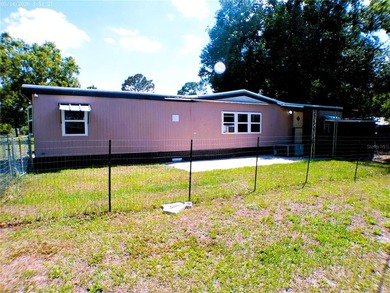 This updated, 2-bedroom, 1.5-bath mobile home, built in 1973 - photo 1