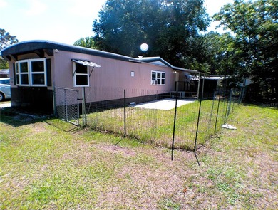 This updated, 2-bedroom, 1.5-bath mobile home, built in 1973 - photo 3