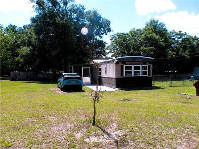 This updated, 2-bedroom, 1.5-bath mobile home, built in 1973 - photo 5