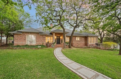 Set beneath a canopy of mature trees, there is an ease to this - photo 5