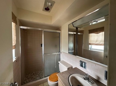 Welcome to 1727 Cornwallis Pkwy, a classic SE Cape Coral home