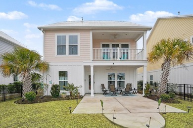 Southern charm meets peaceful waterfront living in this
