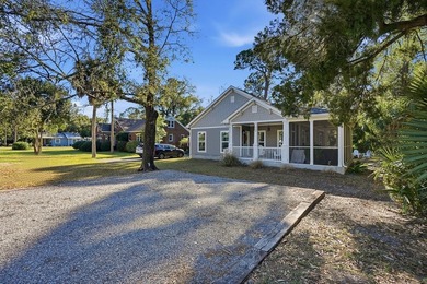 Tucked beneath a canopy of mature oaks in historic Apalachicola - photo 3