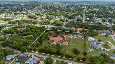 Set on a rare and expansive 5.4-acre parcel in the heart of town - photo 7