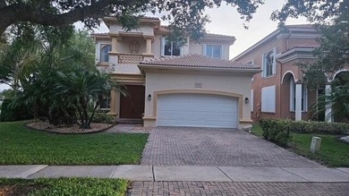 Discover this elegant former model home in the sought-after - photo 1