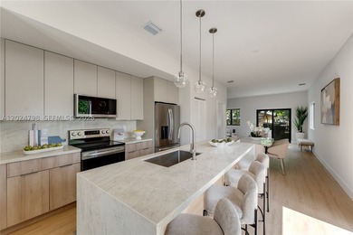 Discover modern living in the heart of Allapattah-one of Miami's - photo 3