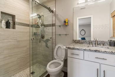 This 3BR/2BA home offers comfort, convenience, and income - photo 9