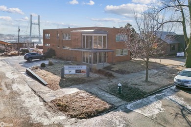 This two-story office building, originally built in 1956 and - photo 2