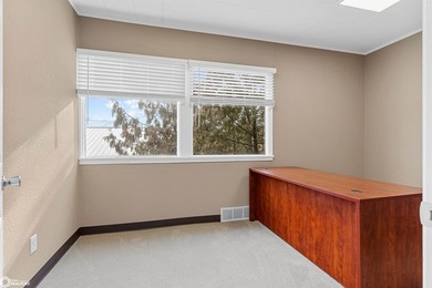 This two-story office building, originally built in 1956 and - photo 5