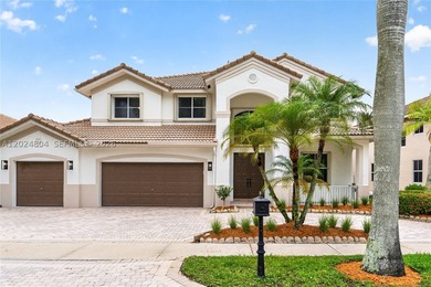 GORGEOUS LAKE FRONT HOME IN THE HIGHLY DESIRABLE GATED COMMUNITY - photo 1