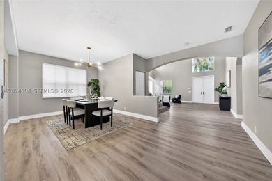 GORGEOUS LAKE FRONT HOME IN THE HIGHLY DESIRABLE GATED COMMUNITY - photo 9