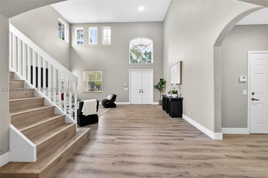 GORGEOUS LAKE FRONT HOME IN THE HIGHLY DESIRABLE GATED COMMUNITY - photo 10