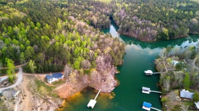 This updated 3BR/2BA bungalow is on Smith Lake is being offered - Lake Home For Sale in Double Springs, Alabama