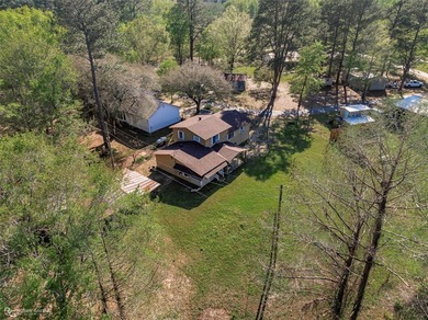 PRICE IMPROVEMENT! Welcome to your peaceful waterfront escape on - photo 4