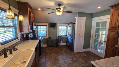 Charming Country Cape Cod home in the Incorporated Village of - photo 6