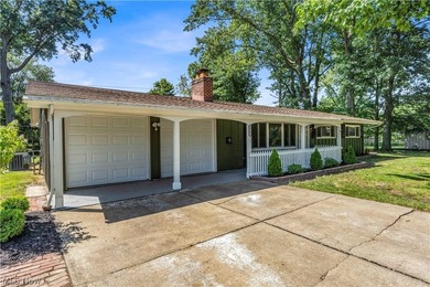 Beautifully updated and move-in ready ranch-style slab is - photo 1