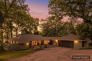 This 4-bedroom, 3-bath midcentury lake home offers 100 feet of - photo 2