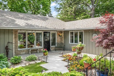 This 4-bedroom, 3-bath midcentury lake home offers 100 feet of - photo 5