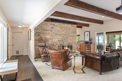 This 4-bedroom, 3-bath midcentury lake home offers 100 feet of - photo 8