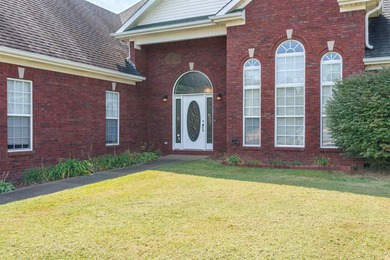 Welcome to this beautifully maintained 3 bed | 2 bath brick home