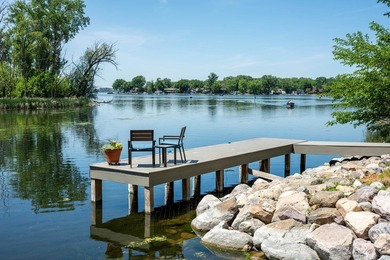 Completely reimagined and thoughtfully expanded, this Lake - photo 4