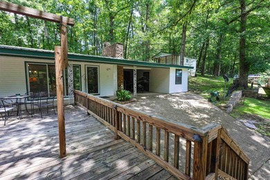 Enjoy seasonal views of Lake Greeson from this 3-bedroom, 2-bath - photo 4