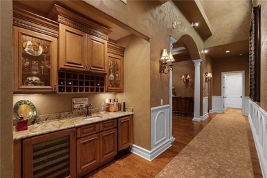 Nestled within the prestigious The Cliffs at Keowee Springs and - photo 12