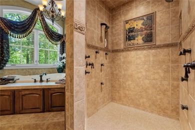 Nestled within the prestigious The Cliffs at Keowee Springs and - photo 21