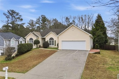 Fantastic Opportunity! This ranch home sits on just under half