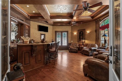 Nestled within the prestigious The Cliffs at Keowee Springs and - photo 24