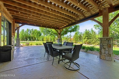 Nestled on an extraordinary 1.17-acre parcel in the charming - photo 50