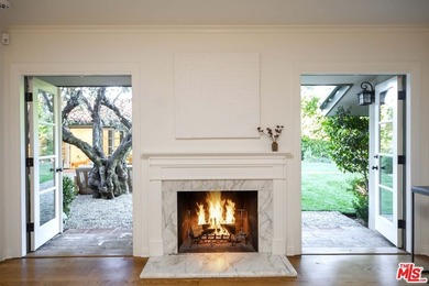 Set on a rare half-acre lot just moments from the Riviera - photo 11