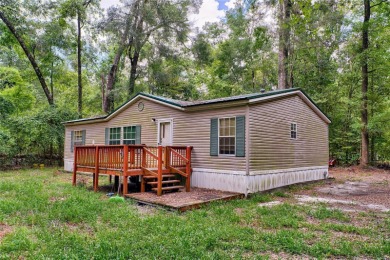 Lake Home For Sale in Fort White, Florida