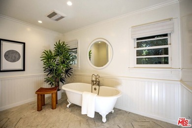 Set on a rare half-acre lot just moments from the Riviera - photo 12