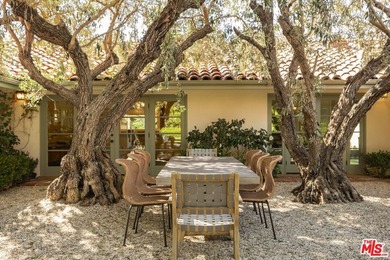 Set on a rare half-acre lot just moments from the Riviera - photo 22