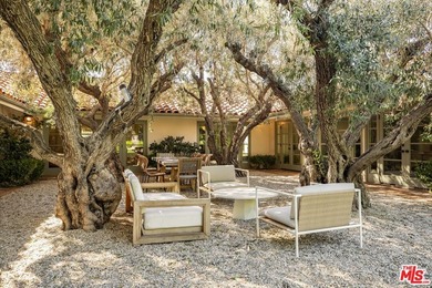 Set on a rare half-acre lot just moments from the Riviera - photo 25
