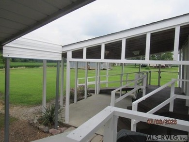 WELL MAINTAINED HOME. HAS A WHEELCHAIR RAMP.HOME IS - photo 27