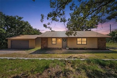 Experience lakefront living in this beautifully renovated home - photo 1