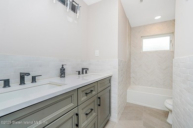 SAVO BROTHERS QUALITY CONSTRUCTION. Stunning Two Family Center - photo 21