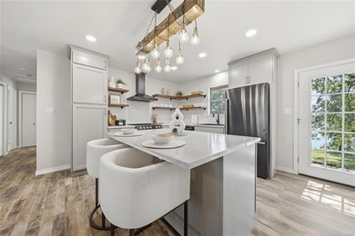 Experience lakefront living in this beautifully renovated home - photo 5