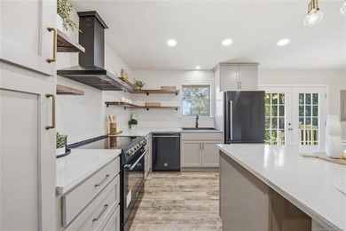 Experience lakefront living in this beautifully renovated home - photo 8
