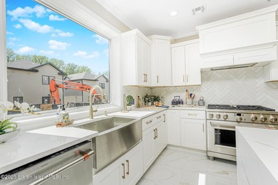 SAVO BROTHERS QUALITY CONSTRUCTION. Stunning Two Family Center - photo 34
