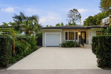 Nestled on a picturesque tree-lined street just steps from the - photo 1