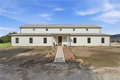 Completed in 2025, this impressive 3,500 sq. ft. home on 8+ - photo 1