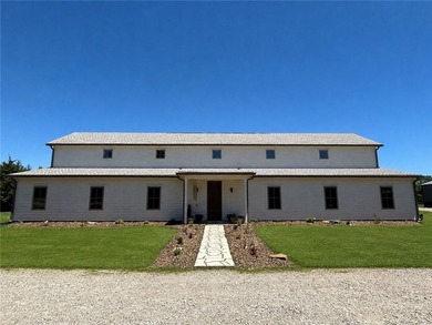 Completed in 2025, this impressive 3,500 sq. ft. home on 8+ - photo 2