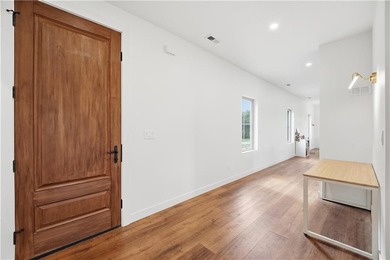 Completed in 2025, this impressive 3,500 sq. ft. home on 8+ - photo 9
