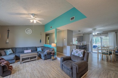 Welcome to this charming 2-bedroom, 2-bath pool home in the - photo 4