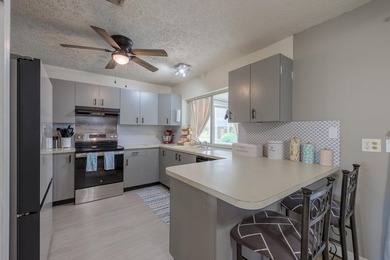 Welcome to this charming 2-bedroom, 2-bath pool home in the - photo 7
