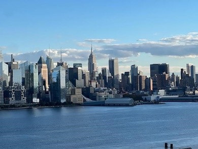 BRIGHT AND SUNNY,TASTEFULLY RE-IMAGINED OPEN-PLAN ONE BEDRM/1.5